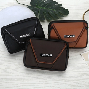 Close-up of three men's faux leather belt pouches in black, dark coffee, and tan brown colors