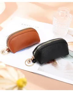 Litchi pattern faux leather coin purses in black and brown with golden zippers