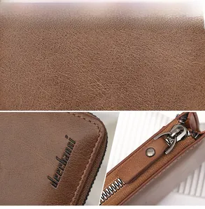 Detailed macro shots of the brown leather texture, metal zipper and embossed brand logo