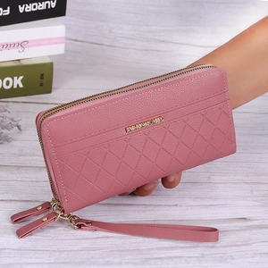 Pink quilted faux leather long wallet with double zippers and detachable wristlet strap