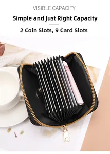 Detail view of multi-slot card holder with 9 slots and 2 coin pockets in black faux leather