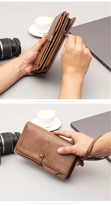 Brown long leather wallet for men featuring multiple card slots and a wrist strap
