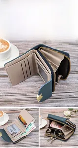 Detailed view of trifold wallet compartments including multiple card slots and coin pocket