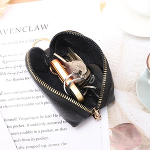 Black lychee pattern faux leather coin purse with gold zipper and internal key ring