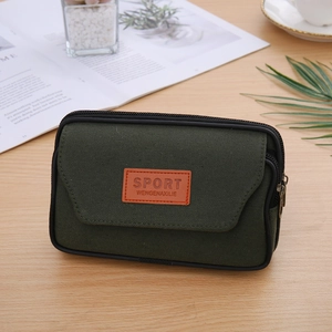 Detail of army green canvas belt pouch with dual zippers and durable sport patch