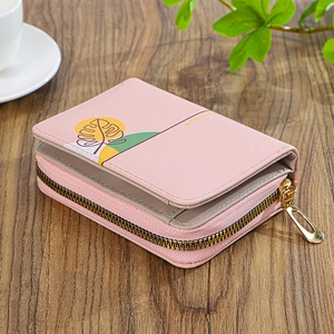 Macro view of pink floral PU leather wallet featuring gold zipper and Forever logo