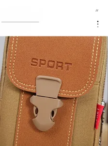 Close-up of high strength buckle and sport logo on durable oxford fabric phone pouch
