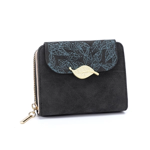 Compact women's bifold wallet with teal leaf print and gold-tone leaf buckle charm