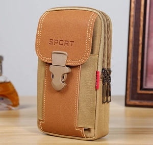 Detail of dual zipper compartments and buckle closure on men's oxford fabric phone holster