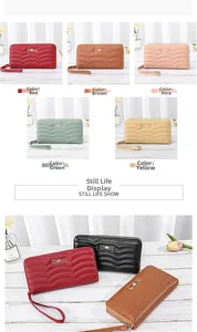 Multi-color long zip wallets for women with wave quilted pattern and metal bow detail