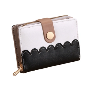 Short wave-line women's wallet featuring a color-block design with buckle and zipper