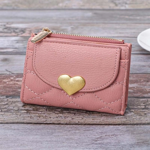 Pink lychee leather short wallet with gold heart clasp and quilted diamond stitching