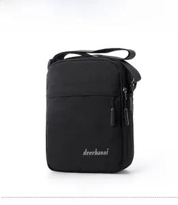 Front view of black lightweight nylon crossbody bag with dual zipper compartments