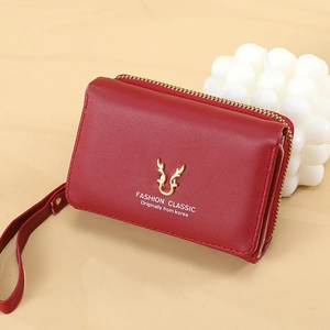 Women's burgundy PU leather wallet with golden deer horn charm and wrist strap