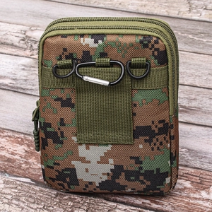 Detail of digital camouflage tactical waist bag with zippers and metal carabiner hook