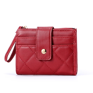 Red quilted leather short wallet with zip closure and wrist strap for women