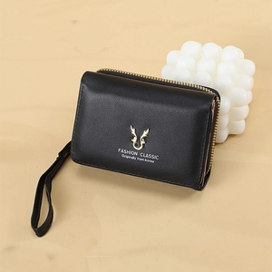 Black PU leather mini wallet featuring a gold deer motif and secure zip closure