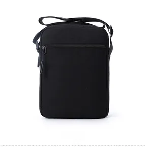 Detail view of the black crossbody bag back with a hidden horizontal zipper pocket