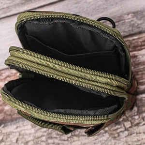 Detail view showing internal multi-layer compartments of camo tactical waist bag