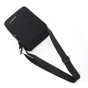 Men's minimalist black shoulder bag in durable nylon with adjustable strap and logo detail
