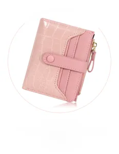 Macro detail of pink stone texture PU leather wallet with card slots and zipper pocket