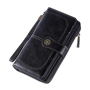 Portefeuille femme RFID noir avec boucle florale en métal et dragonne amovible