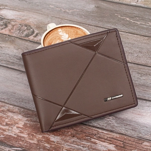 Men's slim brown wallet with geometric stitching on a rustic wooden tabletop setting