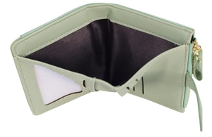 Detail view of mint green wallet interior showing card slots and golden zipper pocket