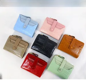 Close-up of stone pattern leather wallets with multiple card slots and zipper pocket