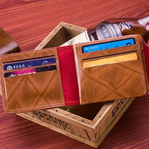 Detailed view of brown lychee leather wallet with multiple card slots and red lining