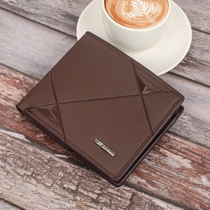 Men's brown slim trifold leather wallet with geometric stitching on wood background