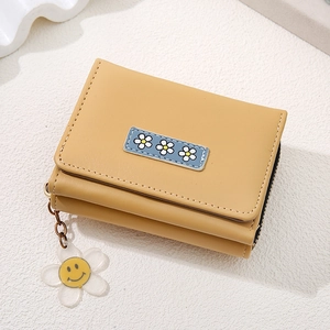 Three-fold warm yellow PU leather wallet for women with daisy embroidery and smiley pendant