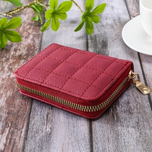 Elegant wine red quilted leather zipper card holder for women with gold hardware