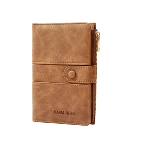 Brown RFID blocking leather passport holder with zipper pocket and snap closure