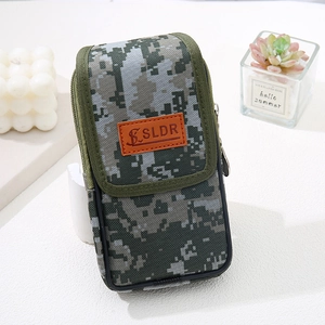 Detail of digital camouflage canvas phone holster with SLDR leather logo patch for belt