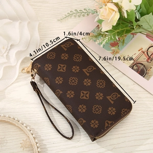 Detailed dimensions of a vintage floral brown clutch with double zippers and wrist strap