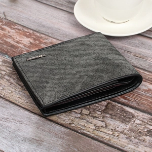 Close-up of short men's wallet in grey textured fabric with black faux leather edges