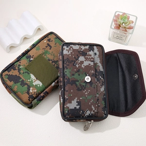 Macro view of canvas belt pouches with digital camo patterns and magnetic snap closures