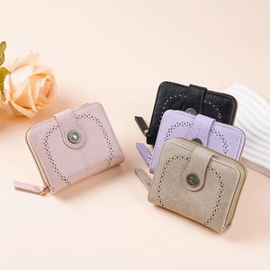 Close-up of stylish PU leather wallets featuring heart hollow design and metal buttons