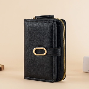 Fashionable black lychee grain wallet with gold ring buckle and secure zipper closure