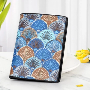 Short wallet with vintage shell pattern on marble surface with tulips and blinds