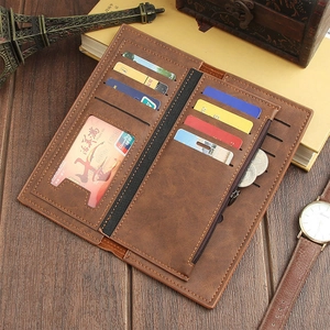Retro long men's leather wallet with multi-card slots and zipper pocket on wood