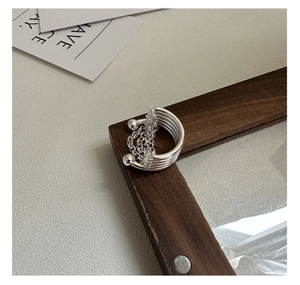 Detailed view of the S925 sterling silver multi-layer chain ring with metallic beads