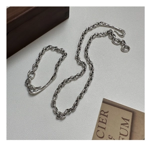 Detailed close-up of S925 sterling silver chunky chain link bracelet with vintage texture