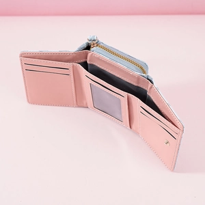 Internal layout of tri-fold wallet with card slots, ID window and pink faux leather finish