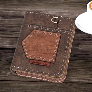 Detail view of brown vintage men's wallet with white stitching and metal side zipper