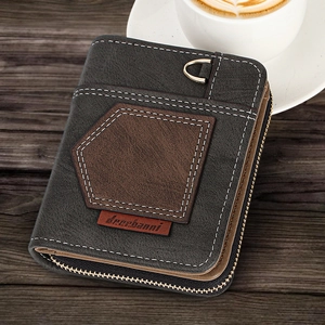 Close-up of charcoal gray men's wallet featuring brown leather patch and white contrast stitching