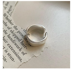 Close-up of S925 sterling silver ring featuring a polished finish and authentic hallmark