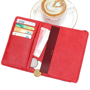 Red leather travel passport holder with multi-card slots and RFID protection