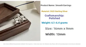 Detailed view of irregular S925 sterling silver hoop earrings with polished finish